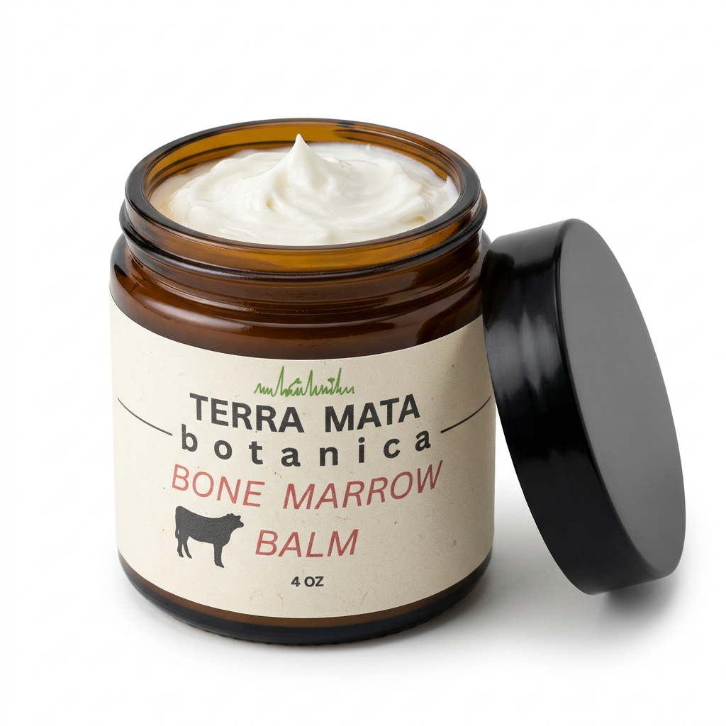 Bone Marrow Balm with the lid off and whipped white cream on a white background